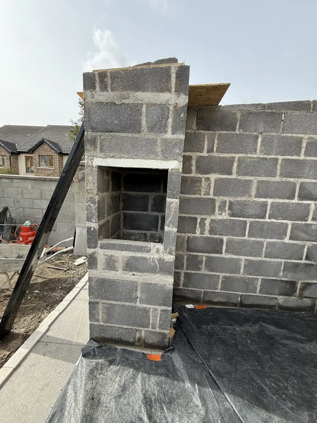 Block BBQ and flue being built