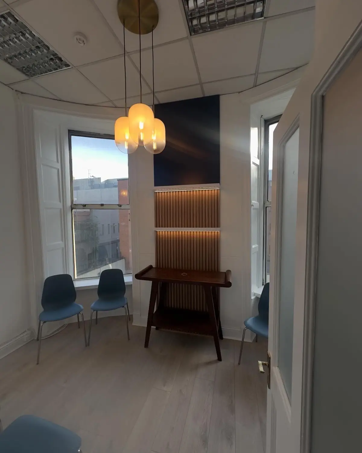 Consultation room with pendant and feature wall, Clinic, Dublin 1