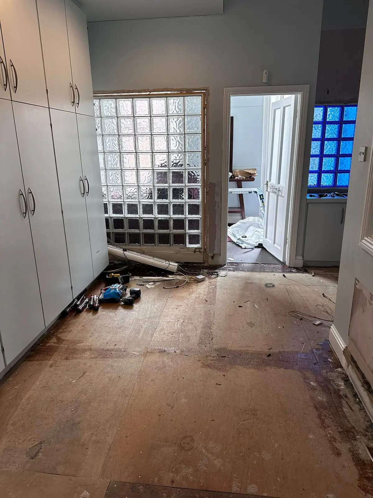 Existing glass block wall and corridor