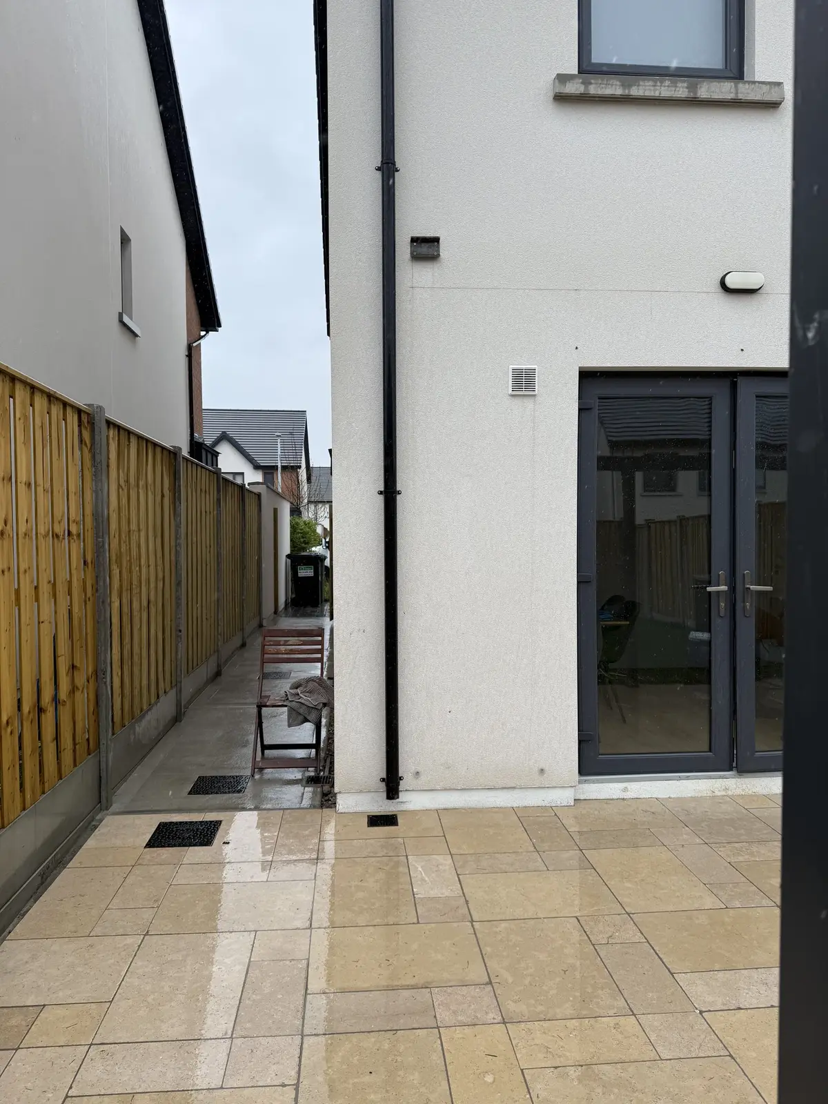 Sandstone-colour porcelain side path and rear patio, Duleek
