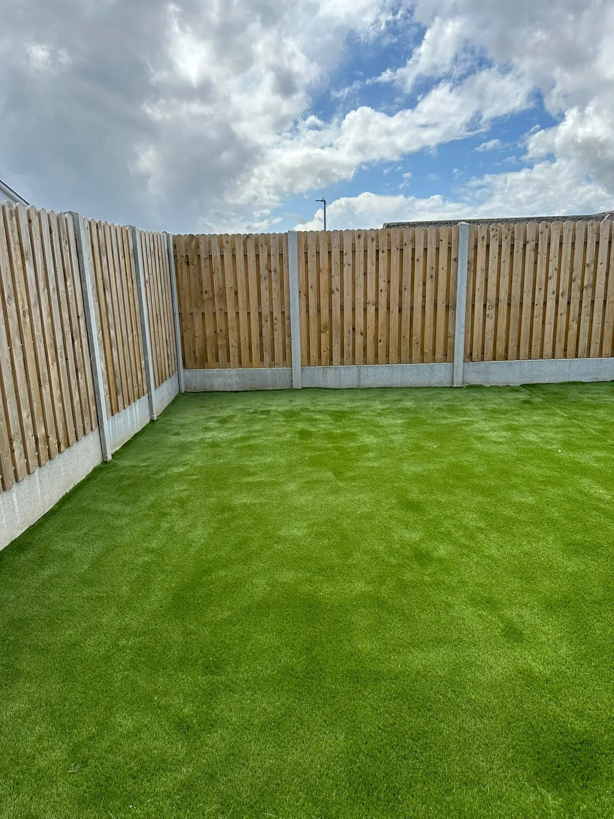 New fencing and artificial grass