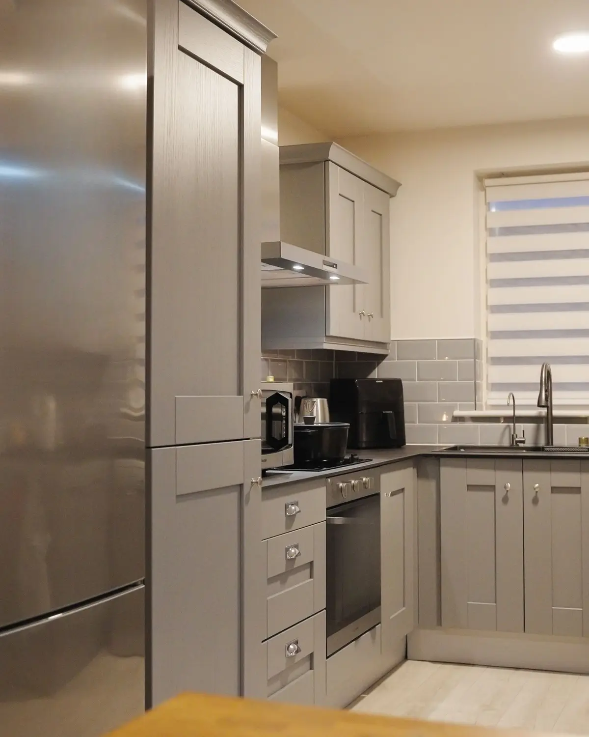Tall units and fridge housing