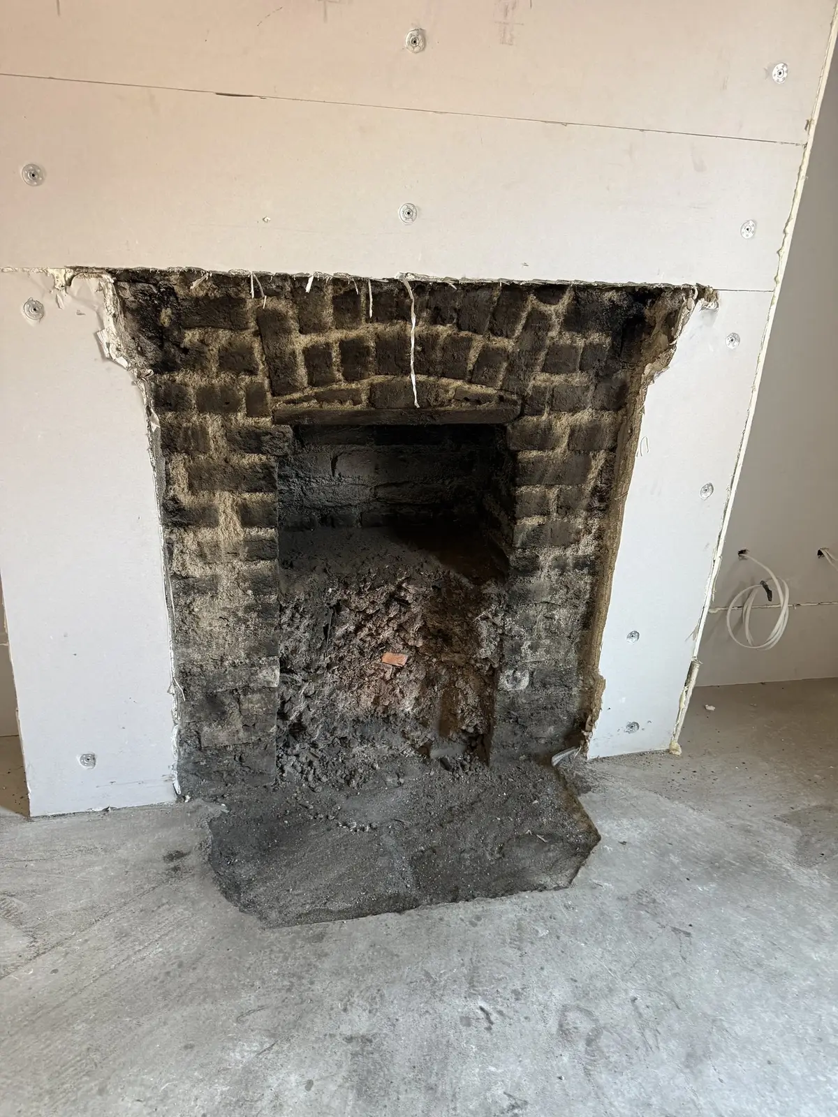 Original fireplace opened up