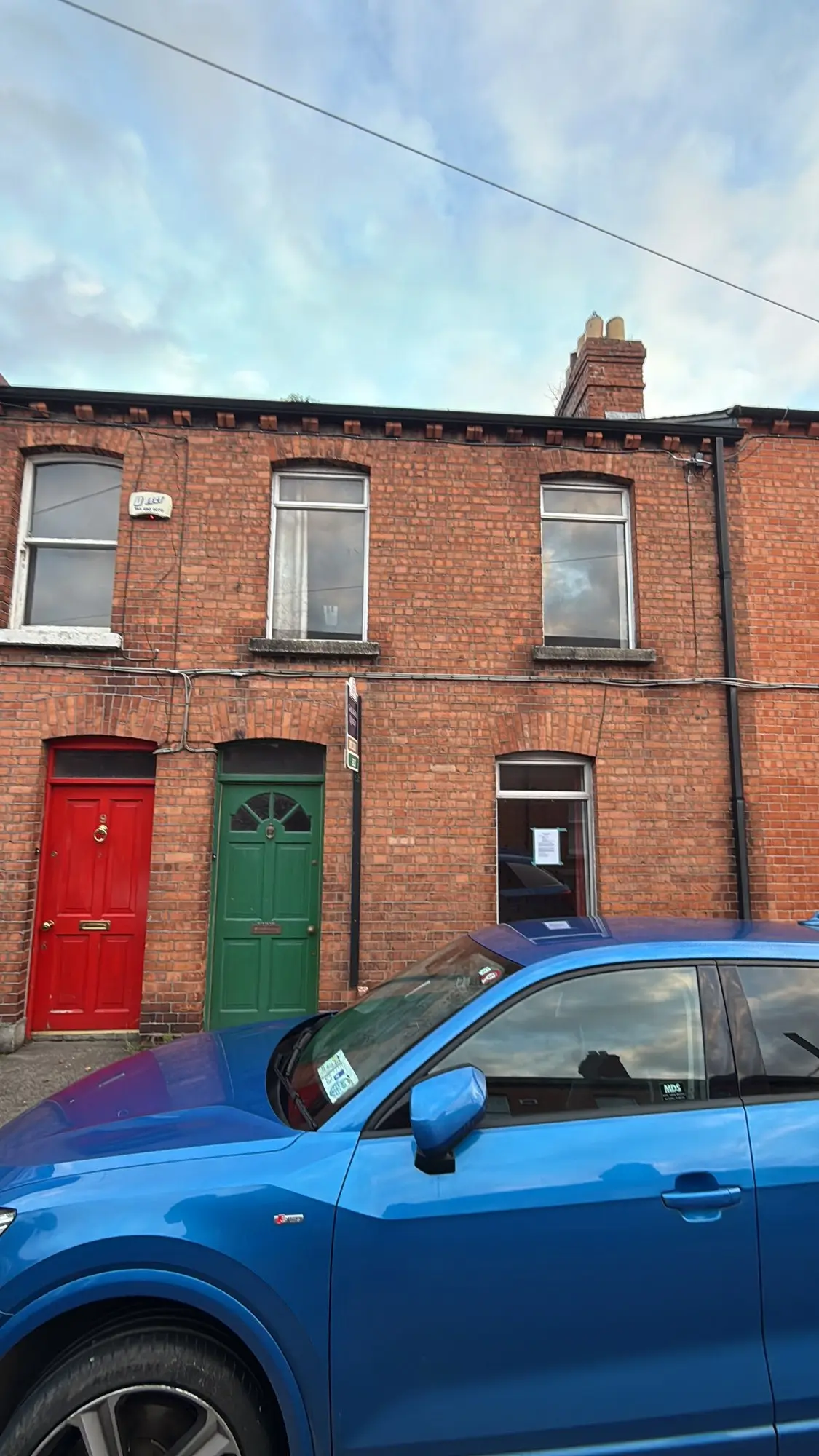 The red-brick front before the works