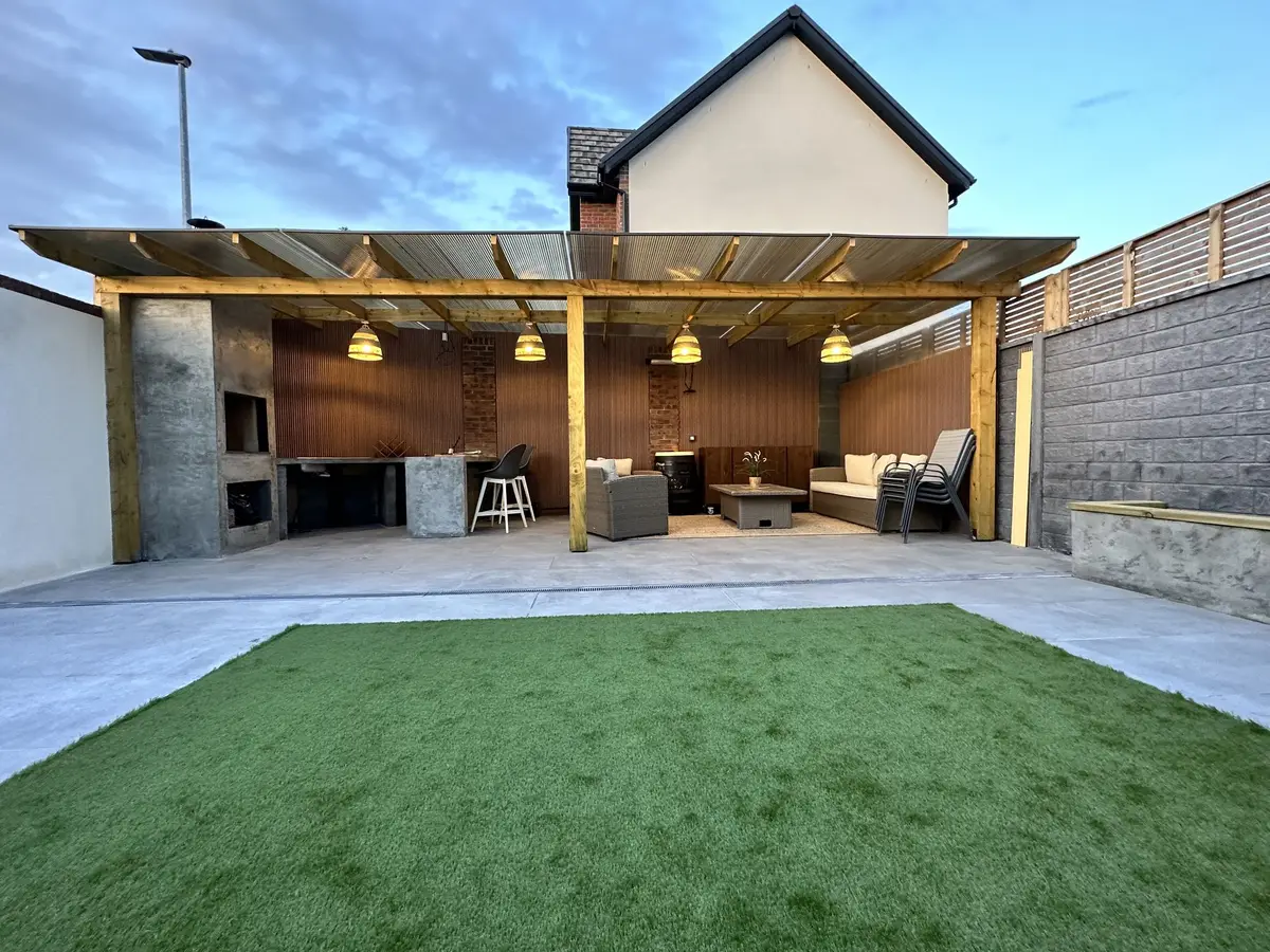 Timber veranda with outdoor kitchen and lounge