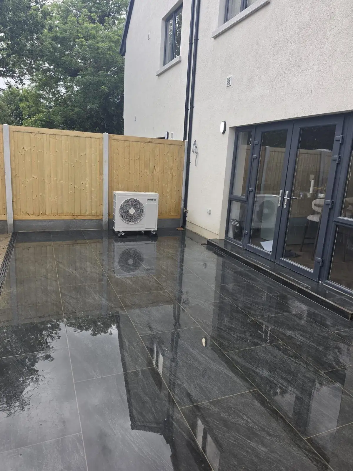 Dark porcelain rear patio with a linear drain, Dublin
