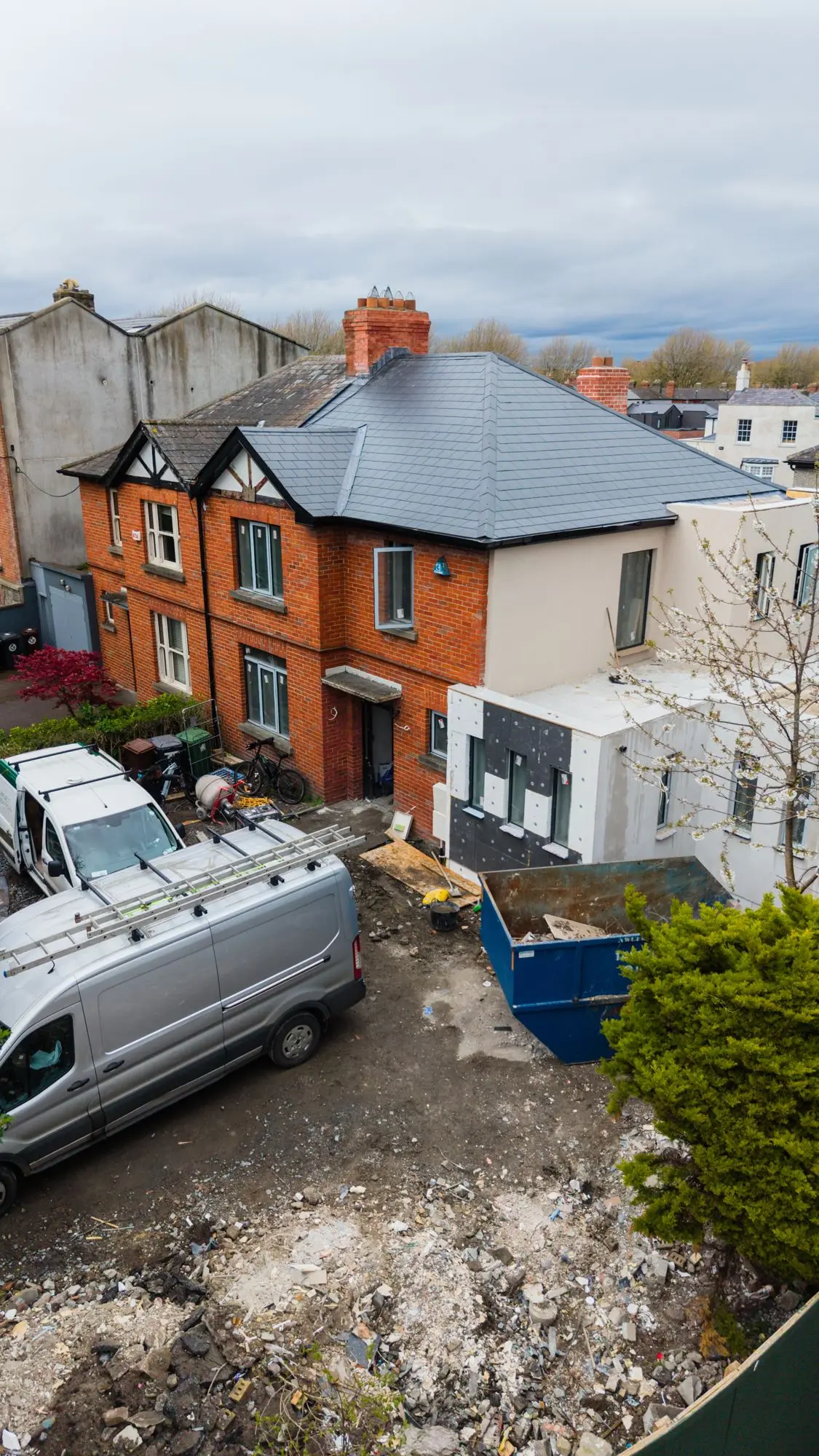 Drone view of the site, van and skip