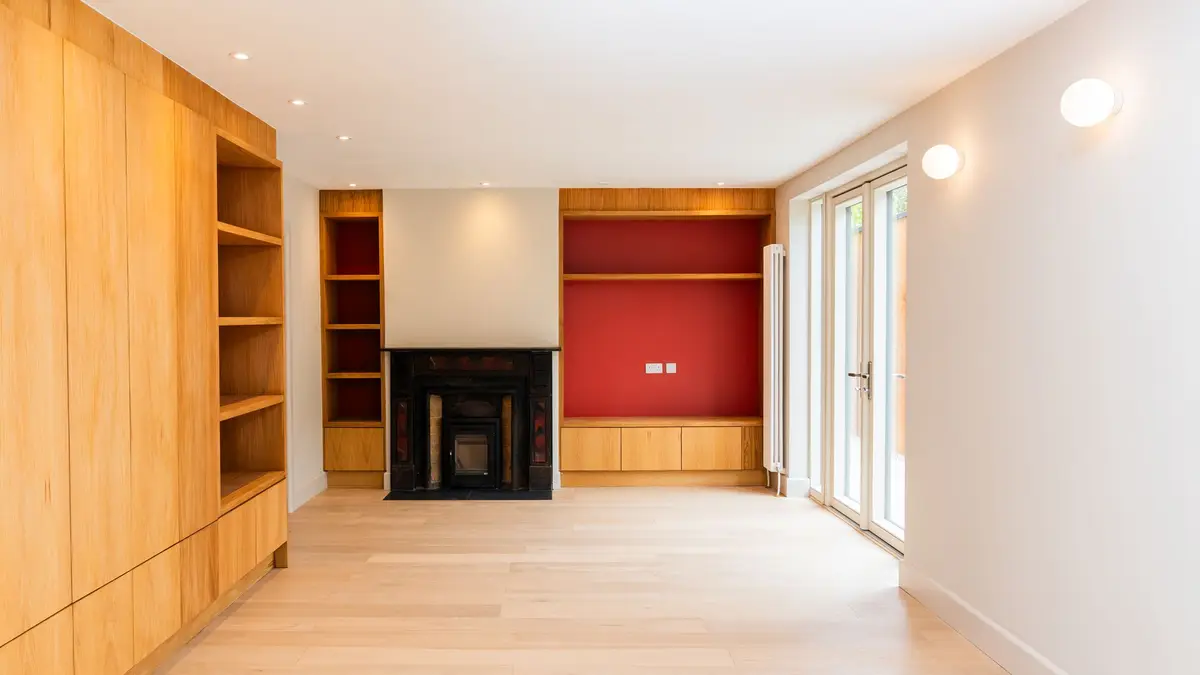 Living room fireplace between oak joinery, Phibsborough