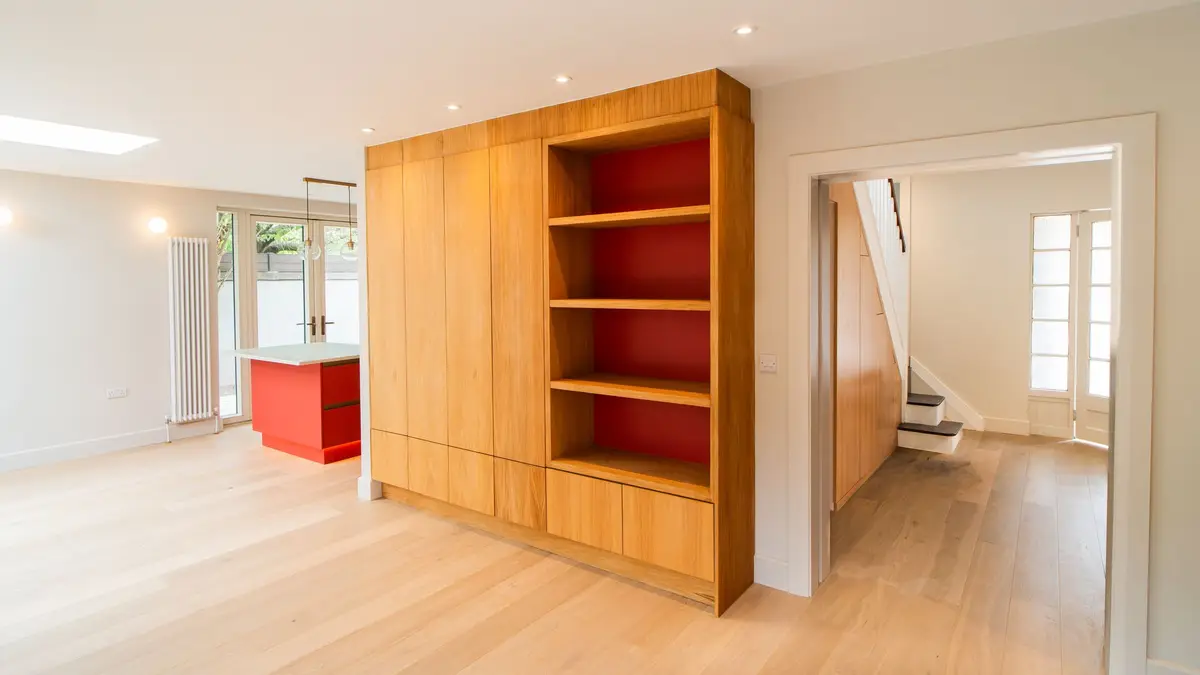 Oak and red joinery wall from the kitchen, Phibsborough