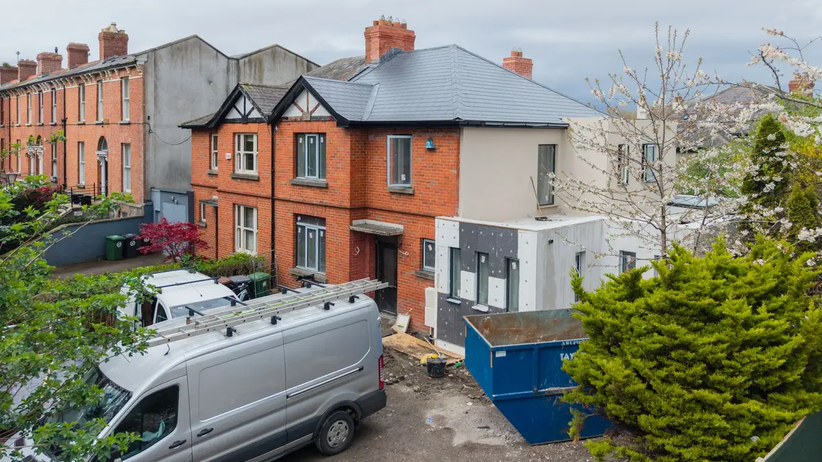 Site set-up: van, skip, extension