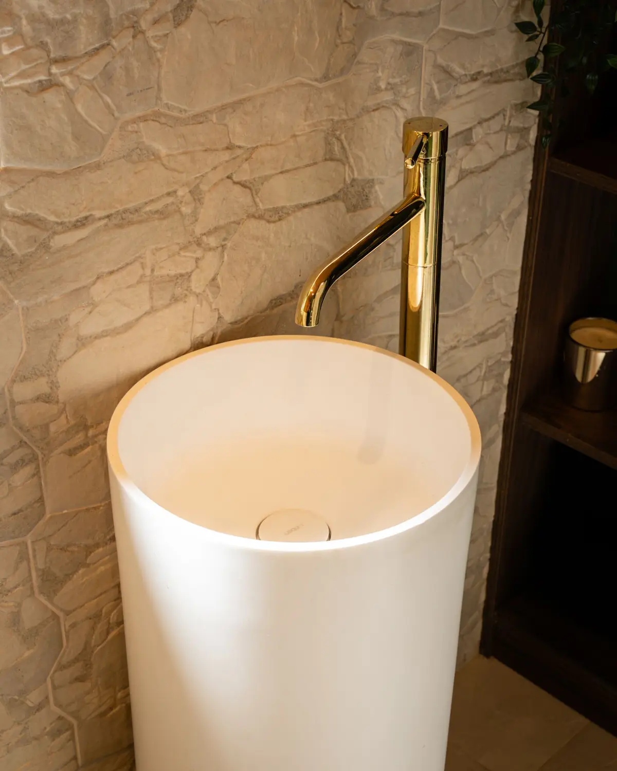 Pedestal basin and brass tap