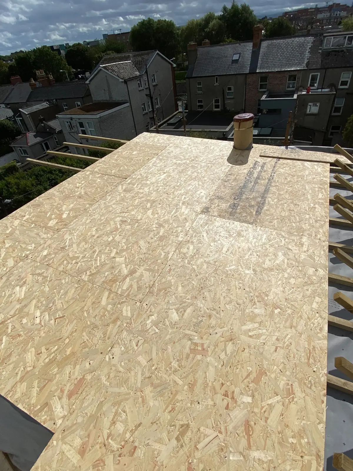 Roof deck boarded over the new upper floor